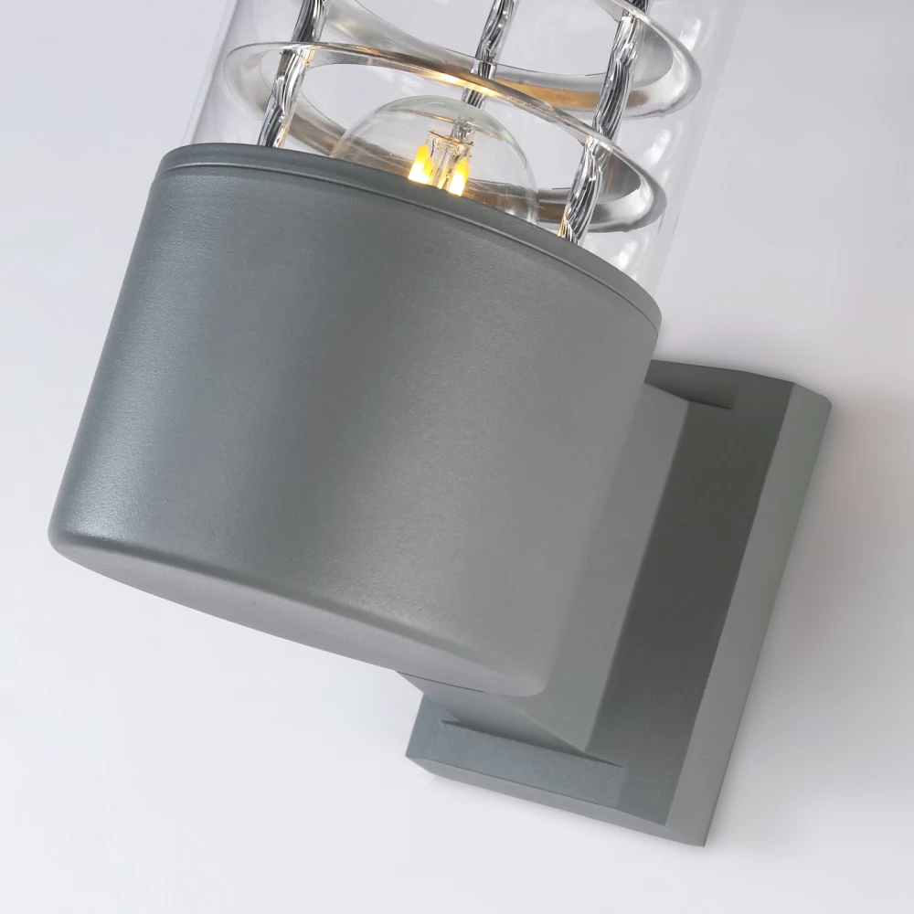 Уличный настенный архитектурный светильник ST2521 GR/CL серый/прозрачный IP54 E27 max 11W 200*110*155 - Viokon.com